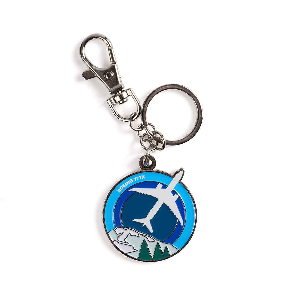 Skyward keychain, featuring the iconic Boeing 777X in a roundel design.